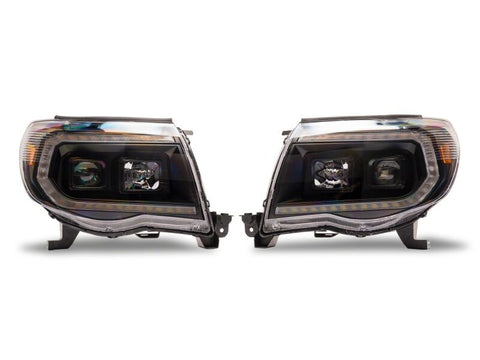 Raxiom 05-11 Toyota Tacoma Axial Series Switchback Projector Headlights- Black Housing- Clear Lens - TT23361