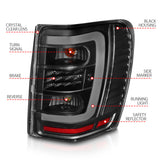 ANZO 1999-2004 Jeep Grand Cherokee LED Tail Lights w/ Light Bar Black Housing Clear Lens - 311394
