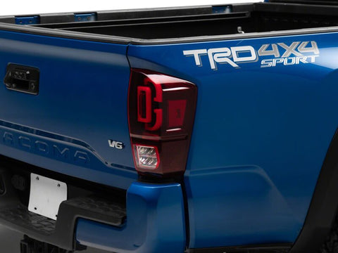 Raxiom 16-23 Toyota Tacoma XW Series Sequential LED Tail Lights- Black Housing- Red Lens - TT30332
