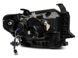 Raxiom 14-21 Toyota Tundra Axial Projector Headlights w/ SEQL LED Bar- Blk Housing (Clear Lens) - TU16011