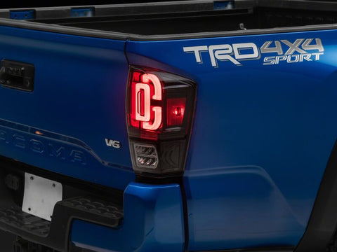 Raxiom 16-23 Toyota Tacoma XW Series Sequential LED Tail Lights- Black Housing- Clear Lens - TT30331