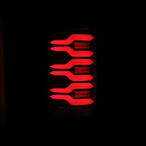 AlphaRex 14-18 GMC Sierra 1500/2500HD/3500HD LUXX-Series LED Tail Lights Blk/Red w/Actv Lgt Seq. Sig - 630050