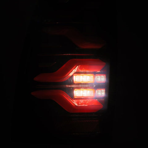 AlphaRex 05-15 Toyota Tacoma LUXX LED Taillights Blk/Red w/Activ Light/Seq Signal - 680070