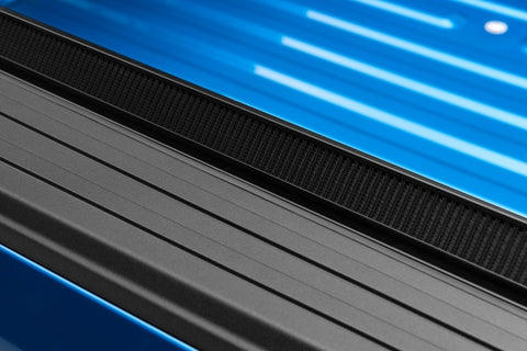 Lund 04-18 Ford F-150 (6.5ft. Bed) Genesis Elite Roll Up Tonneau Cover - Black - 96873