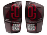 Raxiom 16-23 Toyota Tacoma XW Series Sequential LED Tail Lights- Black Housing- Red Lens - TT30332