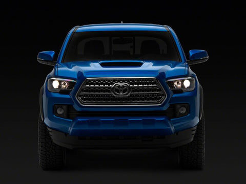 Raxiom 16-23 Toyota Tacoma Axial Series OE Replacement Headlights- Black Housing- Clear Lens - TT26262