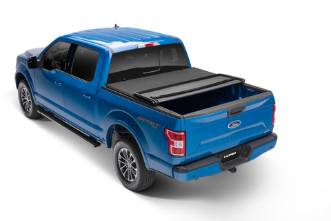Lund 99-17 Ford F-250 Super Duty (6.5ft. Bed) Genesis Elite Tri-Fold Tonneau Cover - Black - 95850