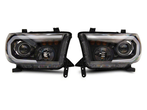 Raxiom 07-13 Toyota Tundra Axial Projector Headlights w/ SEQL LED Bar- Blk Housing (Clear Lens) - TU16007