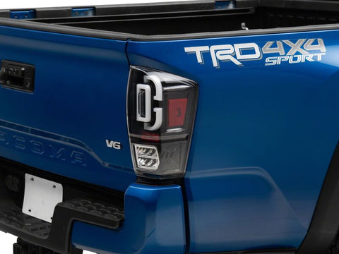 Raxiom 16-23 Toyota Tacoma XW Series Sequential LED Tail Lights- Black Housing- Clear Lens - TT30331