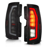 Anzo 07-14 Chevrolet Suburban / 07-14 GMC Yukon Black Full LED Tail Light Plank Style w/ Smoke Lens - 311488