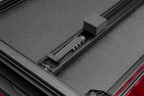Lund 02-17 Dodge Ram 1500 Fleetside (6.4ft. Bed) Hard Fold Tonneau Cover - Black - 969250