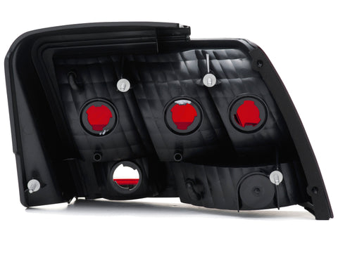 Raxiom 99-04 Ford Mustang Excluding 99-01 Cobra Tail Lights- Black Housing (Smoked Lens) - 49080