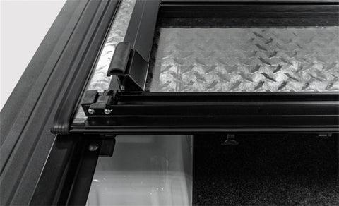 Access LOMAX Tri-Fold Cover Black Urethane 19+ Dodge Ram - 5ft 7in Bed (Except Classic - w/ RamBox) - B3040059