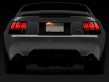 Raxiom 99-04 Ford Mustang Excluding 99-01 Cobra Tail Lights- Black Housing (Smoked Lens) - 49080