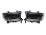 Raxiom 07-13 Toyota Tundra CXR Series LED Projector Headlights- Black Housing- Clear Lens - TU41737