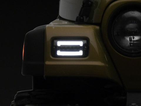 Raxiom 97-06 Jeep Wrangler TJ Axial Series LED Sequential Cornering Lights- Smoked - J211784