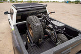 DV8 Offroad Truck Bed Universal Tire Carrier & Accessory Mount - UNBM-01