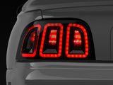 Raxiom 96-98 Ford Mustang Icon LED Tail Lights- Black Housing (Smoked Lens) - 389876