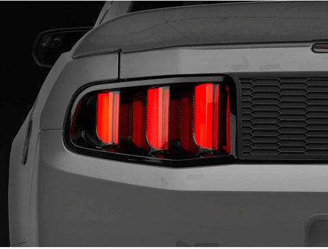 Raxiom 10-12 Ford Mustang Vector V2 LED Tail Lights - Gloss Black Housing (Clear Lens) - 405839