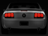 Raxiom 05-09 Ford Mustang Tail Lights- Black Housing (Smoked Lens) - 49066