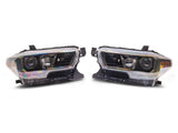 Raxiom 16-23 Toyota Tacoma Axial Series OE Replacement Headlights- Black Housing- Clear Lens - TT26262