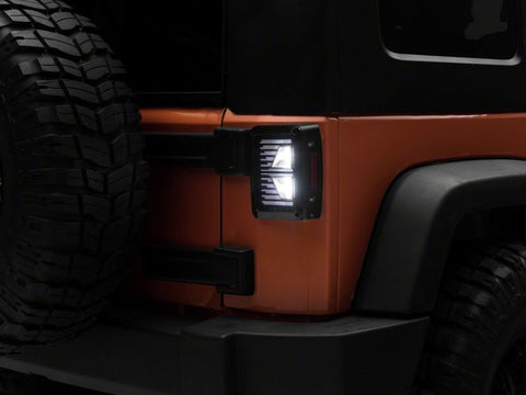 Raxiom 07-18 Jeep Wrangler JK Axial Series Vision LED Tail Lights- Blk Housing (Clear Lens) - J130809