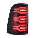 AlphaRex 19-21 Dodge Ram 1500 Luxx-Series LED Tail Lights Black/Red w/Activ Light/Seq Signal - 640050