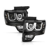 ANZO 2009-2014 Ford F-150 Projector Headlights w/ U-Bar Switchback Black w/ Amber - 111383
