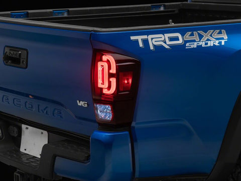 Raxiom 16-23 Toyota Tacoma XW Series Sequential LED Tail Lights- Black Housing- Red Lens - TT30332