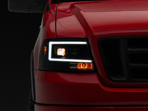 Raxiom 04-08 Ford F-150 Axial Series Projector Headlights- Black Housing- Clear Lens - T569352