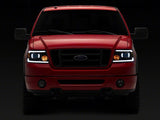 Raxiom 04-08 Ford F-150 Axial Series Projector Headlights with LED Bar- Black Housing- Clear Lens - T566363