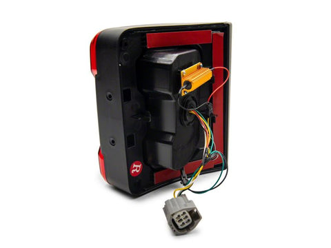 Raxiom 07-18 Jeep Wrangler JK Axial Series JL Style LED Tail Lights- BlkHousing- Red Lens - J164242