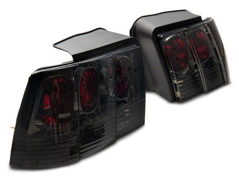 Raxiom 99-04 Ford Mustang Axial Series Altezza Style Tail Lights- Blk Housing (Smoked Lens) - 413422