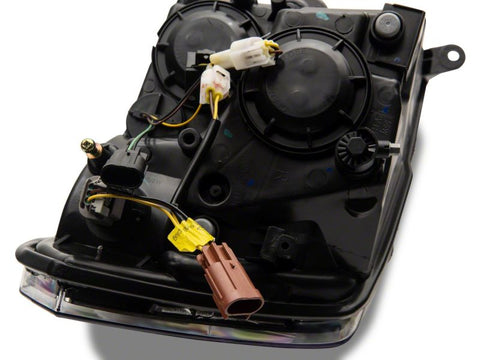 Raxiom 09-18 Dodge RAM 1500/2500/3500 Axial Headlights w/ SEQL LED Bar- Blk Housing (Clear Lens) - R131482