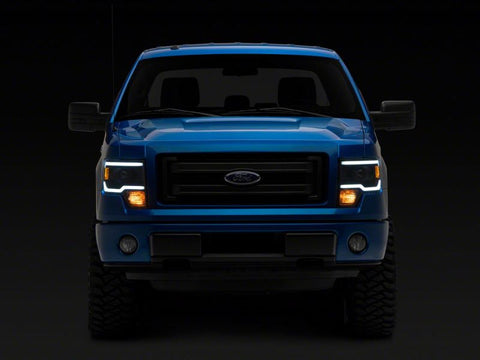 Raxiom 09-14 Ford F-150 Axial Series Projector Headlights w/ LED Light Bar- Blk Housing (Clear Lens) - T566369