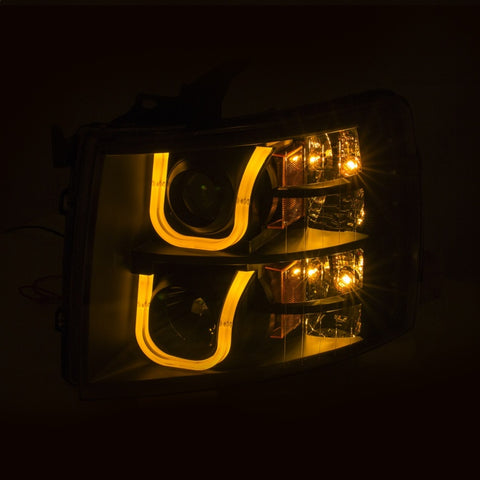 ANZO 2007-2013 Chevrolet Silverado 1500/2500 Projector Headlights w/ U-Bar Switchback Black w/ Amber - 111384