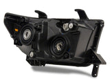 Raxiom 07-13 Toyota Tundra Axial Series Headlights w/ SEQL LED Bar- Blk Housing (Clear Lens) - TU16005