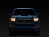 Raxiom 16-23 Toyota Tacoma CXR Series V2 LED Projector Headlights- Black Housing- Clear Lens - TT44175