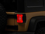 Raxiom 07-18 Jeep Wrangler JK Axial Series LED Tail Lights- Blk Housing (Smoked Lens) - J183262