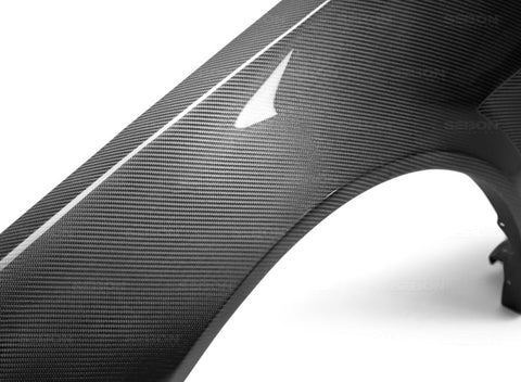 Seibon 99-01 Nissan Skyline R34 NSW-Style Carbon Fiber (Gloss Finish) Fenders (Pair) - FF9901NSR34-NSW