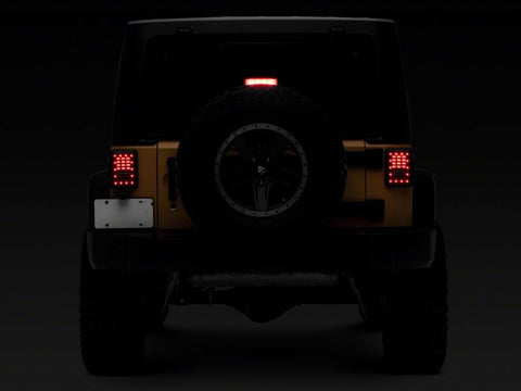 Raxiom 07-18 Jeep Wrangler JK Axial Series LED Tail Lights- Blk Housing (Clear Lens) - J141585