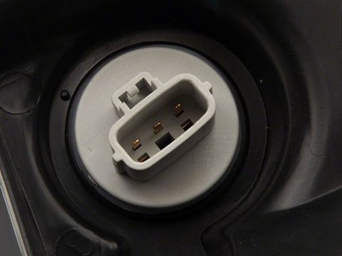 Raxiom 07-13 Toyota Tundra Axial Series Headlights w/ LED Bar- Blk Housing (Clear Lens) - TU16004