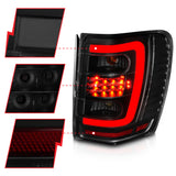 ANZO 1999-2004 Jeep Grand Cherokee LED Tail Lights w/ Light Bar Black Housing Smoke Lens - 311395
