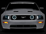 Raxiom 05-09 Ford Mustang w/ Halogen LED Halo Prjctr Headlights-Blk Hsng(Smoked Lens Exclude GT500) - 49128