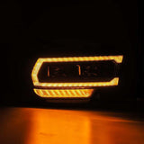 AlphaRex 19-21 Ram 2500 LUXX LED Proj Headlights Plank Style Alpha Blk w/Activ Light/Seq Signal/DRL - 880549