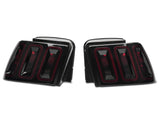 Raxiom 99-04 Ford Mustang Excluding 99-01 Cobra Icon LED Tail Lights- Black Housing (Smoked Lens) - 100807