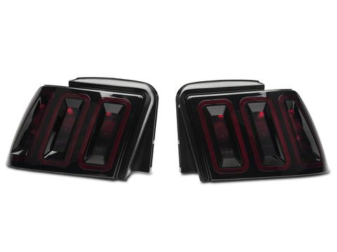 Raxiom 99-04 Ford Mustang Excluding 99-01 Cobra Icon LED Tail Lights- Black Housing (Smoked Lens) - 100807