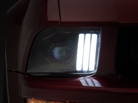 Raxiom 05-09 Ford Mustang w/ Halogen Prjctor Headlights- Black Housing (Clear Lens) (No GT500 ) - 415794