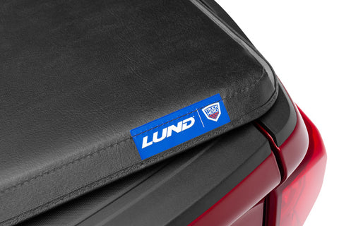 Lund 09-14 Ford F-150 Styleside (5.5ft. Bed) Hard Fold Tonneau Cover - Black - 969355