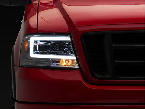 Raxiom 04-08 Ford F-150 Axial Series Projector Headlights- Chrome Housing- Clear Lens - T569353